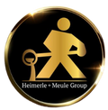 Goldenes Logo der Heimerle + Meule Group mit stilisiertem Goldgießer.